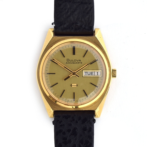 585 - A BULOVA ACCUQUARTZ GOLD FILLED WRIST WATCH
Circa 1974, champaign dial, raised baton markers, transi... 