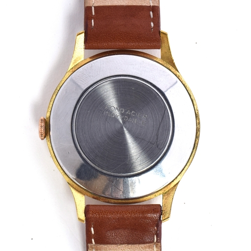 705 - A CAUNY STEEL AND GOLD PLATED OVERSIZED GENT'S WATCH
Circa 1950s, silvered dial, DECO Arabic numbers... 