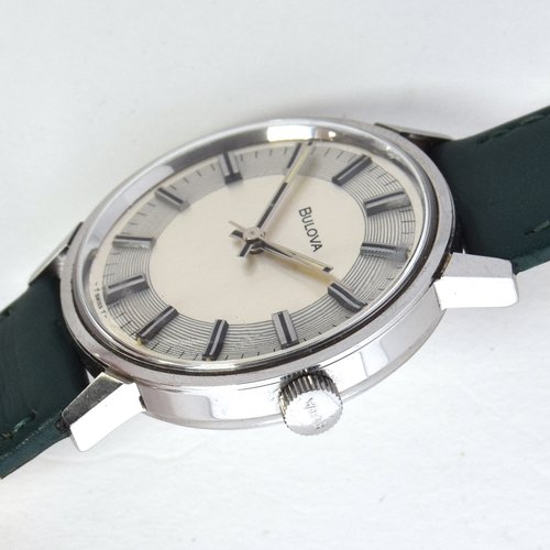 587 - A BULOVA STEEL GENT'S MECHANICAL
1972, silvered dial, raised double baton markers, straight hands
Mo... 