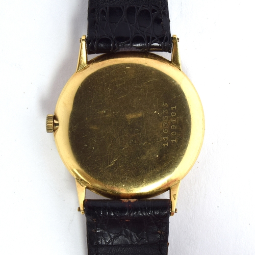 569 - A UNIVERSAL GENEVE 18CT GOLD GENT'S WRIST WATCH 
Circa 1950s, cream two-tier dial, Arabic, subsidiar... 