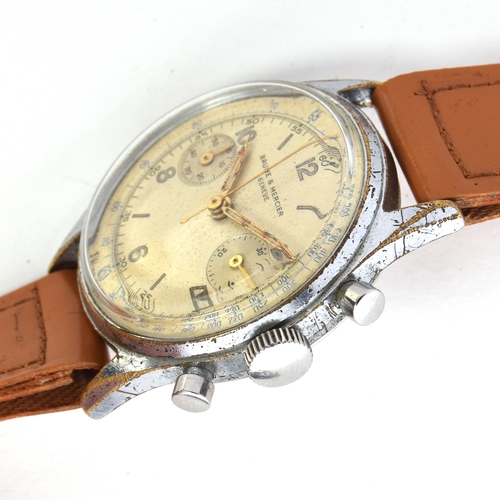 571 - A BAUME AND MERCIER STEEL AND CHROME PLATED CHRONOGRAPH WRIST WATCH
Circa 1950s, cream dial, painted... 