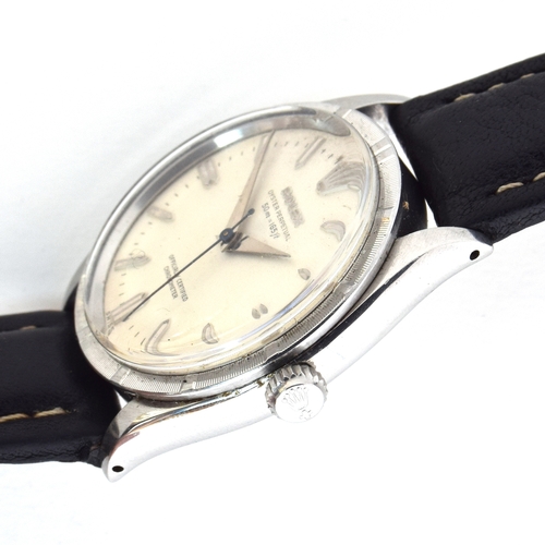 550 - A ROLEX OYSTER PERPETUAL GENTLEMAN'S STEEL WRIST WATCH
Dated 1956, ref. 6569, raised double baton ma... 