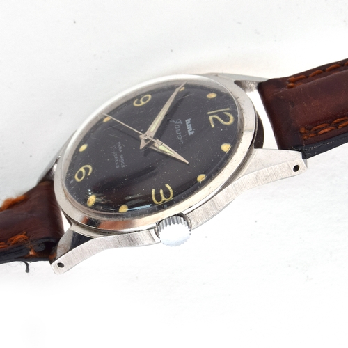 707 - AN HMT FAWAN GENTLEMAN'S STEEL WATCH
Circa 1950s, black dial with Arabic numerals on quarters, screw... 