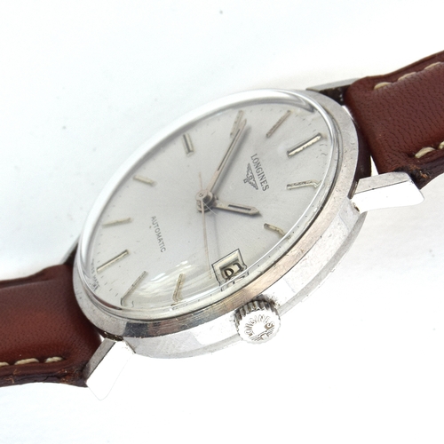 577 - A LONGINES GENTLEMAN'S STEEL AUTOMATIC WRIST WATCH
Circa 1960s, silvered dial with raised silver bat... 