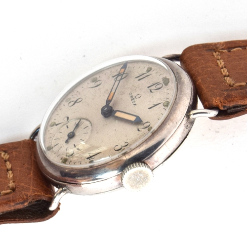 532 - AN OMEGA SILVER GENTLEMAN'S WRIST WATCH
Circa 1920s, white dial with painted Arabic numerals
Movemen... 