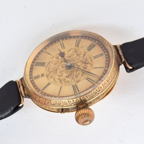 726 - AN 18CT GOLD CONVERTED FOB WATCH
Champagne dial with floral engraving to centre, painted Arabic nume... 