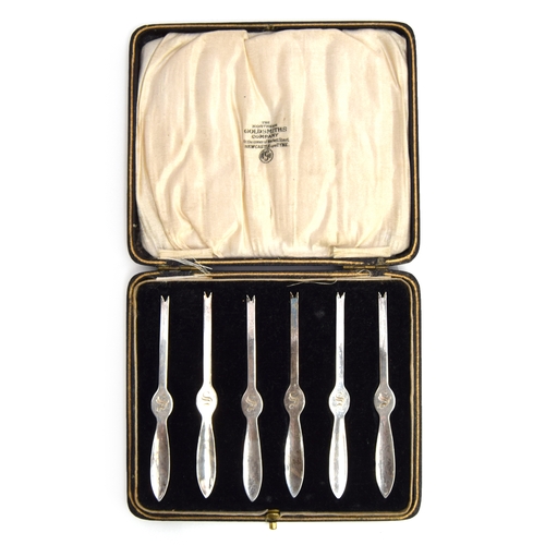 127 - A cased set of six silver lobster picks by William Suckling Ltd, Birmingham 1923, each monogrammed '... 