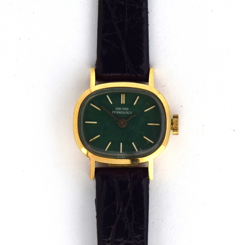 666 - A GIRARD-PERREGAUX LADIES 18CT GOLD MECHANICAL WATCH
Green dial, oval case, diameter 19mm