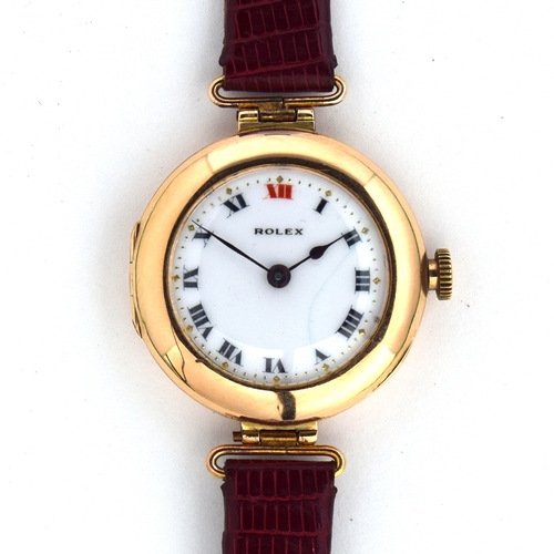 543 - A ROLEX 15CT GOLD MECHANICAL WRIST WATCH
London hallmark for 1915, porcelain dial with Roman numeral... 