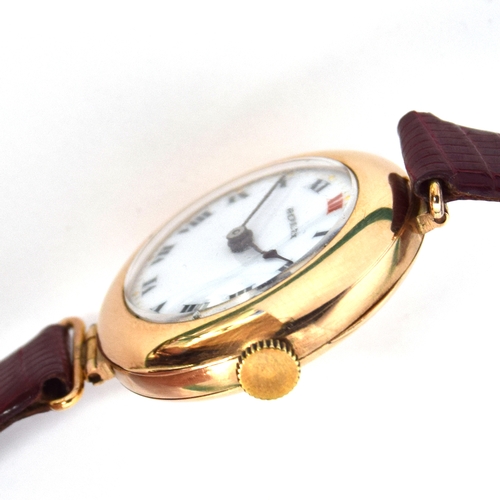 543 - A ROLEX 15CT GOLD MECHANICAL WRIST WATCH
London hallmark for 1915, porcelain dial with Roman numeral... 