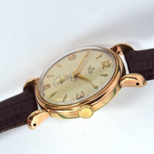 622 - A SMITHS DELUXE 9CT GOLD GENTLEMAN'S MECHANICAL WRIST WATCH
Circa 1950s, cream dial, raised Arabic n... 