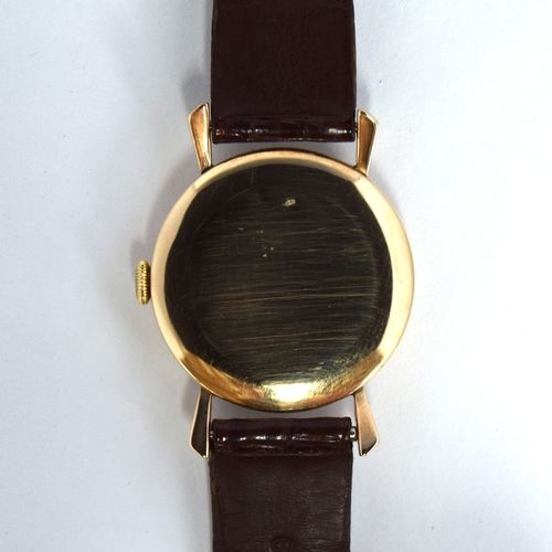 622 - A SMITHS DELUXE 9CT GOLD GENTLEMAN'S MECHANICAL WRIST WATCH
Circa 1950s, cream dial, raised Arabic n... 