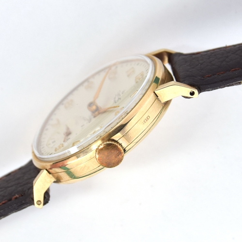 623 - A SMITHS DELUXE 9CT GOLD GENTLEMAN'S MECHANICAL WRIST WATCH
Circa 1950s, cream dial, raised Arabic n... 