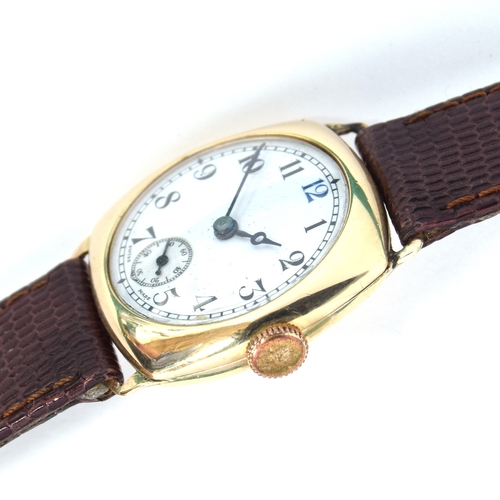 638 - A 9CT GOLD GENTLEMAN'S MECHANICAL WATCH
Circa 1950s, porcelain dial, Arabic numerals with blue 12, s... 