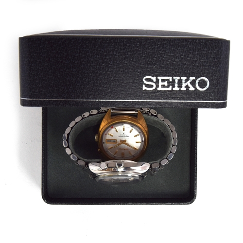 648 - TWO SEIKO BELL-MATIC GENTLEMAN'S AUTOMATIC DAY DATE WRIST WATCHES
One steel, on a steel Seiko bracel... 