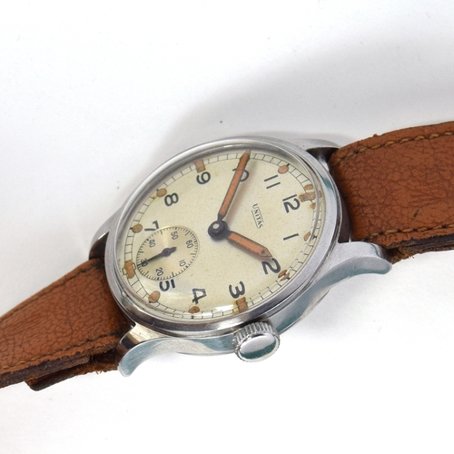 592 - A UNITAS ATP MILITARY STEEL WRIST WATCH
Circa 1930s, case in original unpolished condition, and dial... 