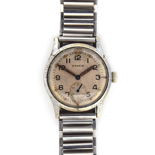 593 - A MOERIS ATP MILITARY WRIST WATCH
Circa 1930s, white dial with subsidiary seconds, Arabic numerals
M... 