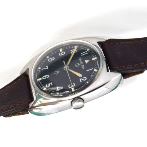 594 - A HAMILTON W10 MILITARY STEEL WATCH
Circa 1975, dial marked Hamilton, T circle, broad arrow
Movement... 