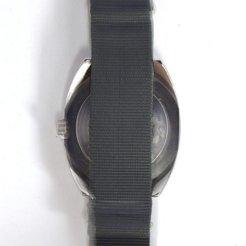 596 - A CWC W10 MILITARY STEEL WRIST WATCH
Dated 1979, black dial with luminous Arabic numerals
Movement: ... 