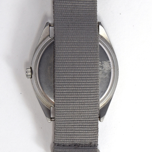 663 - A PULSAR QUARTZ MILITARY STEEL WRIST WATCH
Dated 2002, case back etched with broad arrow above P1139... 