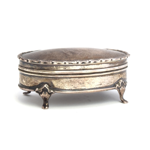 93 - A oval silver trinket box, marks rubbed, hinged lid, on four feet, 9.5cm wide