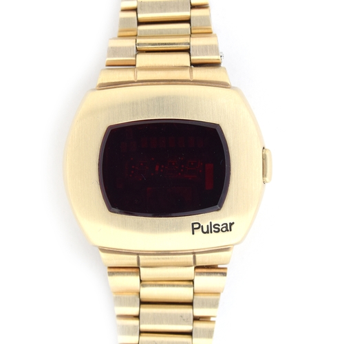 572 - A PULSAR TIME COMPUTER 14CT GOLD FILLED LED BRACELET WATCH  
Circa 1970s, Quartz crystal digital dis... 