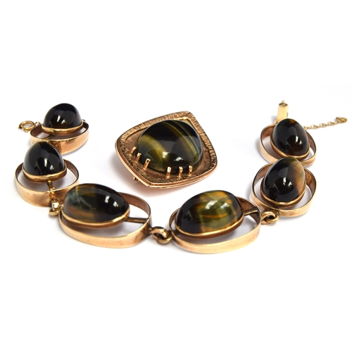 60 - A 9ct gold bracelet set with six tigers eye stones marked JPPE together with a 9ct gold brooch/penda... 