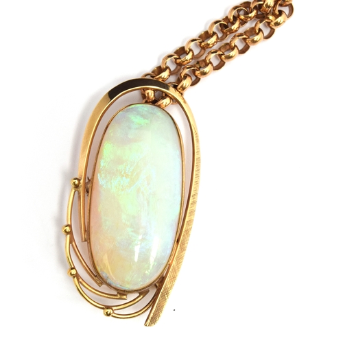 63 - Large opal pendant set in 9ct gold with 9ct chain, gross weight 36g