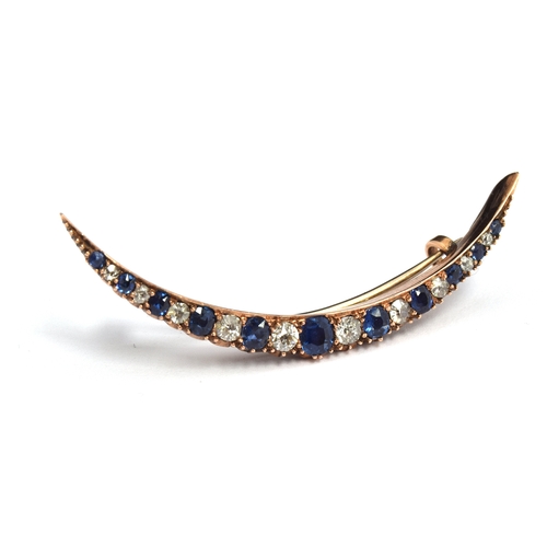 68 - A rose gold brooch set with mine cut diamonds and Ceylon sapphires, gross weight 3.2g