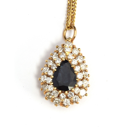 72 - An 18ct gold diamond and sapphire pendant on a 14ct chain, approx 1.5ct of diamonds, gross weight 6.... 