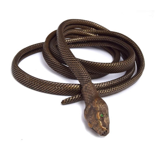 76 - A white metal mesh belt in the form of a snake, 130cm long

Condition: missing one eye