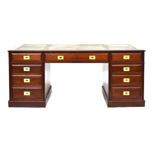 514 - A very large mahogany partner's desk, each side with three drawers, the kneehole flanked on one side... 