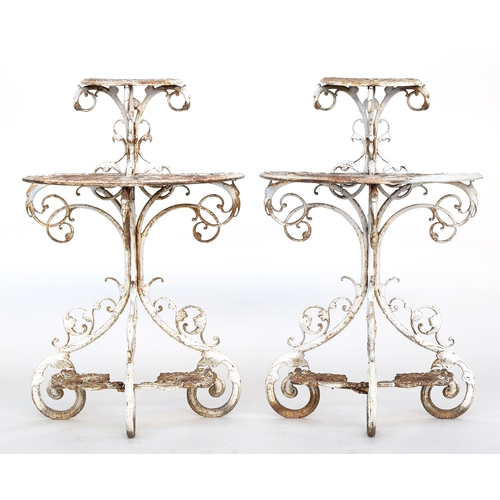 516 - A pair of Coalbrokedale two tier plant stands, c.1870s, with reg marks, 65cm wide x 34cm deep x 99cm... 