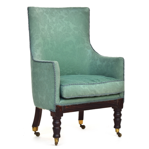 480 - A 19th century bow back upholstered armchair, on turned legs with brass cappings and casters