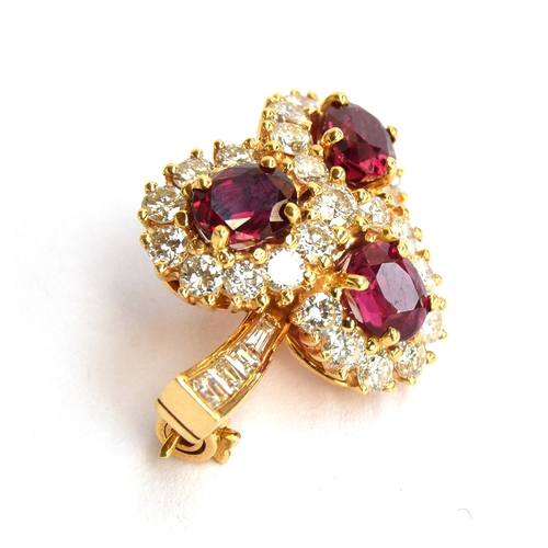 48 - An 18ct gold Graff pendant/brooch set with diamonds and rubies in three cluster heads. Unmarked but ... 