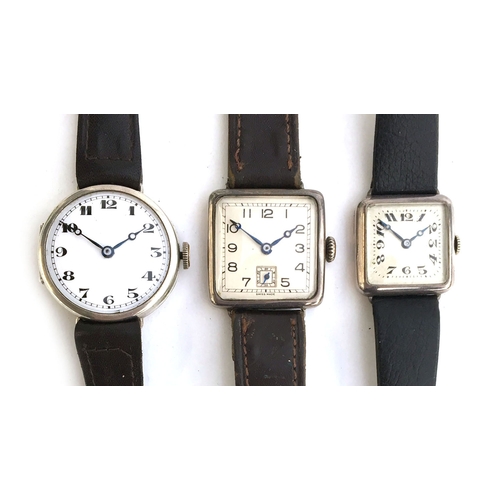 700 - THREE SILVER WATCHES
Two gent's, one ladies, 1917 and 1918, all manual with white dials and Arabic n... 