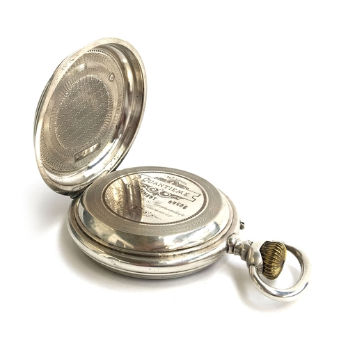 724 - A large French silver cased open face top wound pocket watch with day date and moon phase, 75mm diam... 