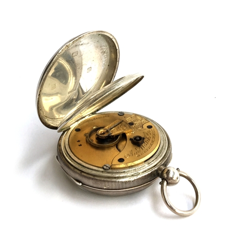 31 - A silver Waltham open face key wind pocket watch, the case by Dennison Watch Case Co, Birmingham 191... 