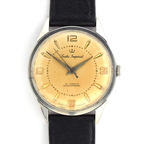 633 - A SMITHS IMPERIAL WATCH
Circa 1950s, cream face with Arabic numerals on quarters
Movement: manual, c... 