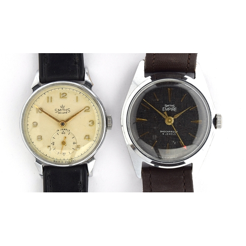 636 - Two Smiths steel mechanical watches, one a black dial Smith's Empire (34mm), the other a white dial ... 