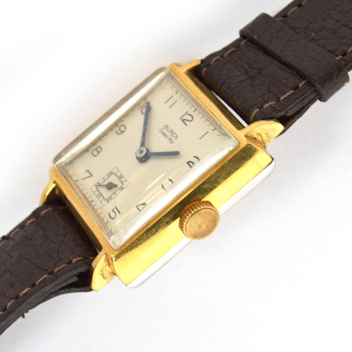 655 - A BUREN GRAND PRIX GENTLEMANS WRIST WATCH
Circa 1950s, white dial, blued steel straight hands, subsi... 