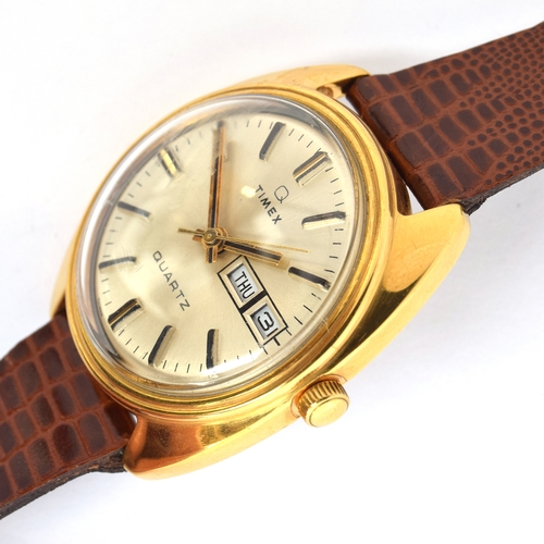 656 - A TIMEX GENTLEMAN'S ELECTROMECHANICAL QUARTZ DAY DATE WATCH
Circa 1970s