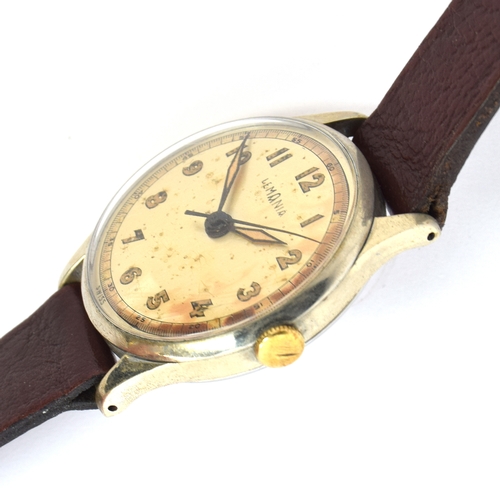 690 - A LEMANIA GENTLEMAN'S WRIST WATCH 
Circa 1950s, silvered dial, patinated, luminous sword hands, arab... 