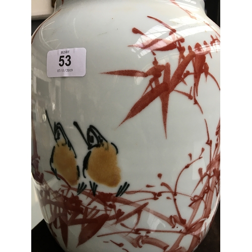 53 - A 20th century Chinese vase, depicting two stylised songbirds amongst bamboo, 31cmH