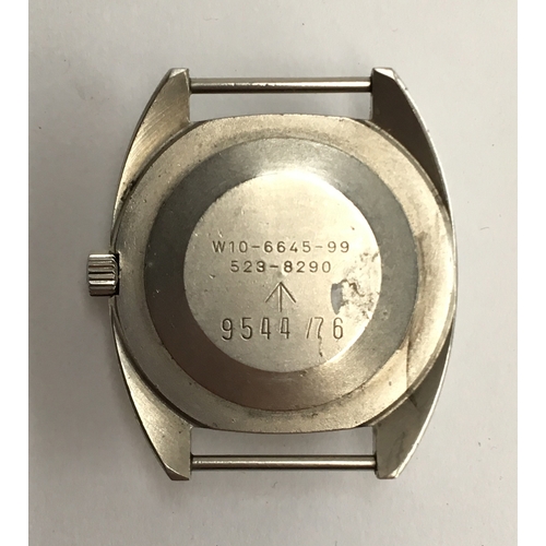 595 - A CWC W10 MILITARY STEEL WRIST WATCH
Dated 1976, black dial with luminous Arabic numerals
Movement: ... 