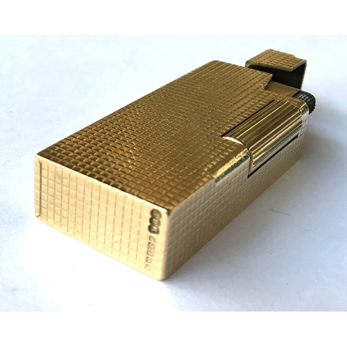 87 - A 9ct gold Dunhill 'Rollagas' lighter, engine turned decoration to case, 5.9cm long, gross weight 73... 