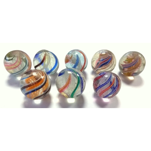 1045 - A collection of eight 19th century latticinio marbles (af), all with core swirls, includes uncommon ... 