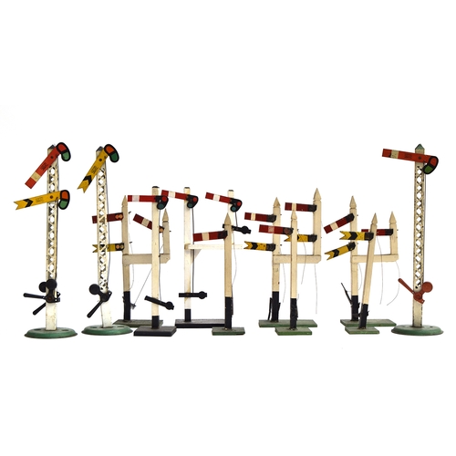 876 - Three Hornby O gauge metal lattice signal posts; together with eight other wooden signal posts (11)