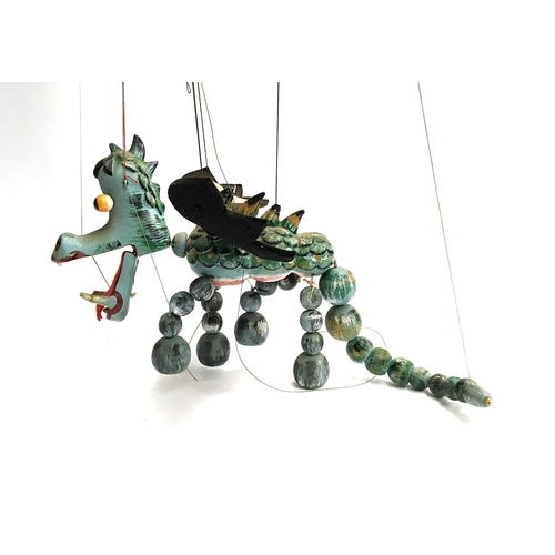 1036 - A Pelham Puppet 'Mother Dragon', wooden body with felt wings; together with 'Baby Dragon', wooden bo... 