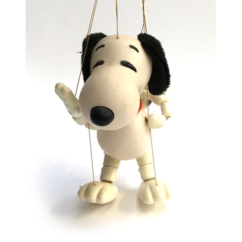 1037 - A Pelham Puppet Snoopy, plastic body with felt ears and collar; together with a Pelham Puppet Orinoc... 